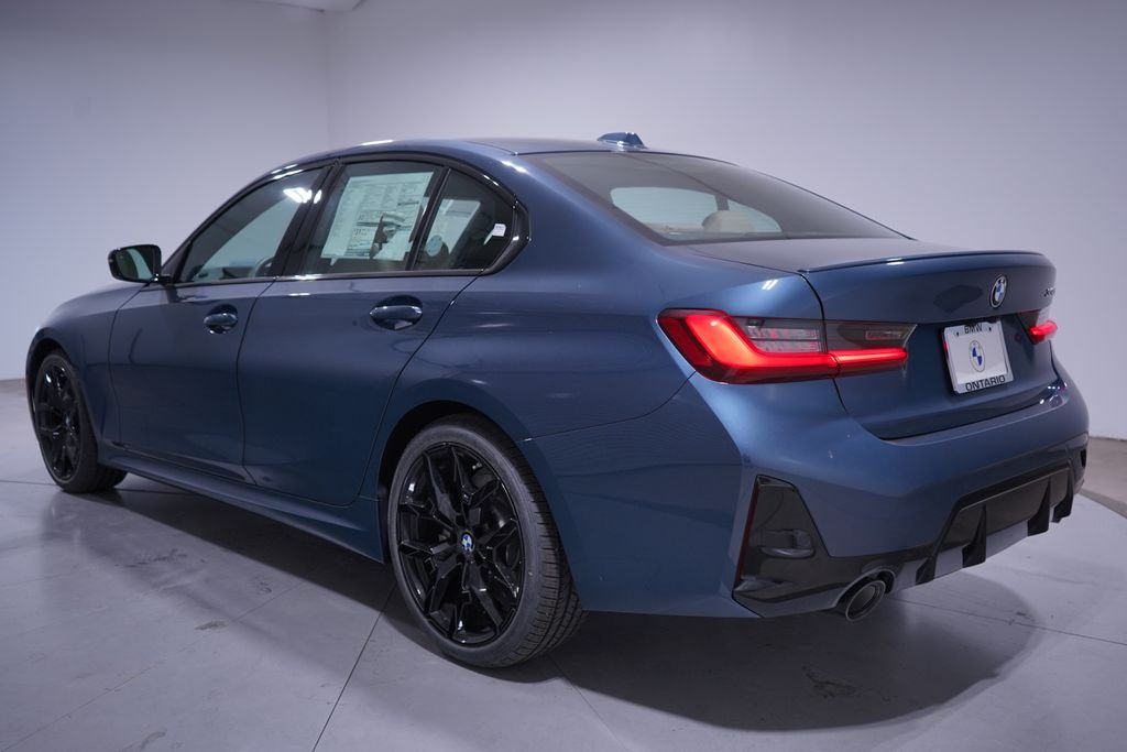 New 2026 Blue Metallic BMW 330i image 3