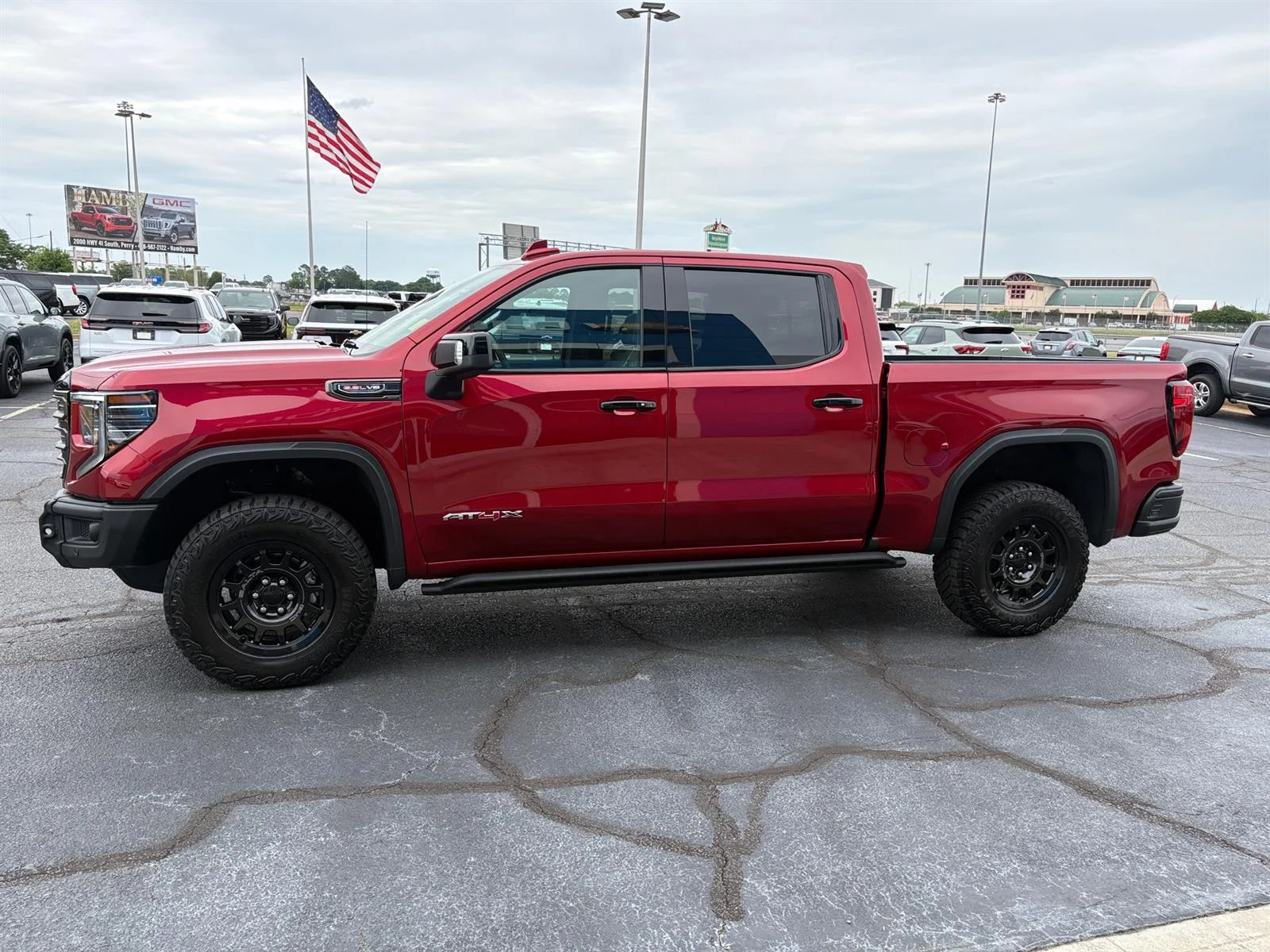 Used 2026 Volcanic Red Tintcoat GMC AT4X image 17