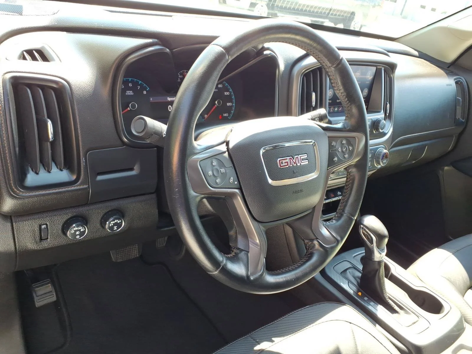 Used 2022 Satin Steel Metallic GMC 4WD AT4 with Leather image 8