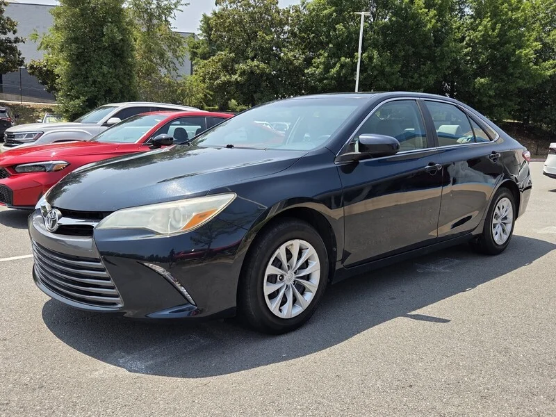 Used 2016 BLACK TOYOTA LE image 1