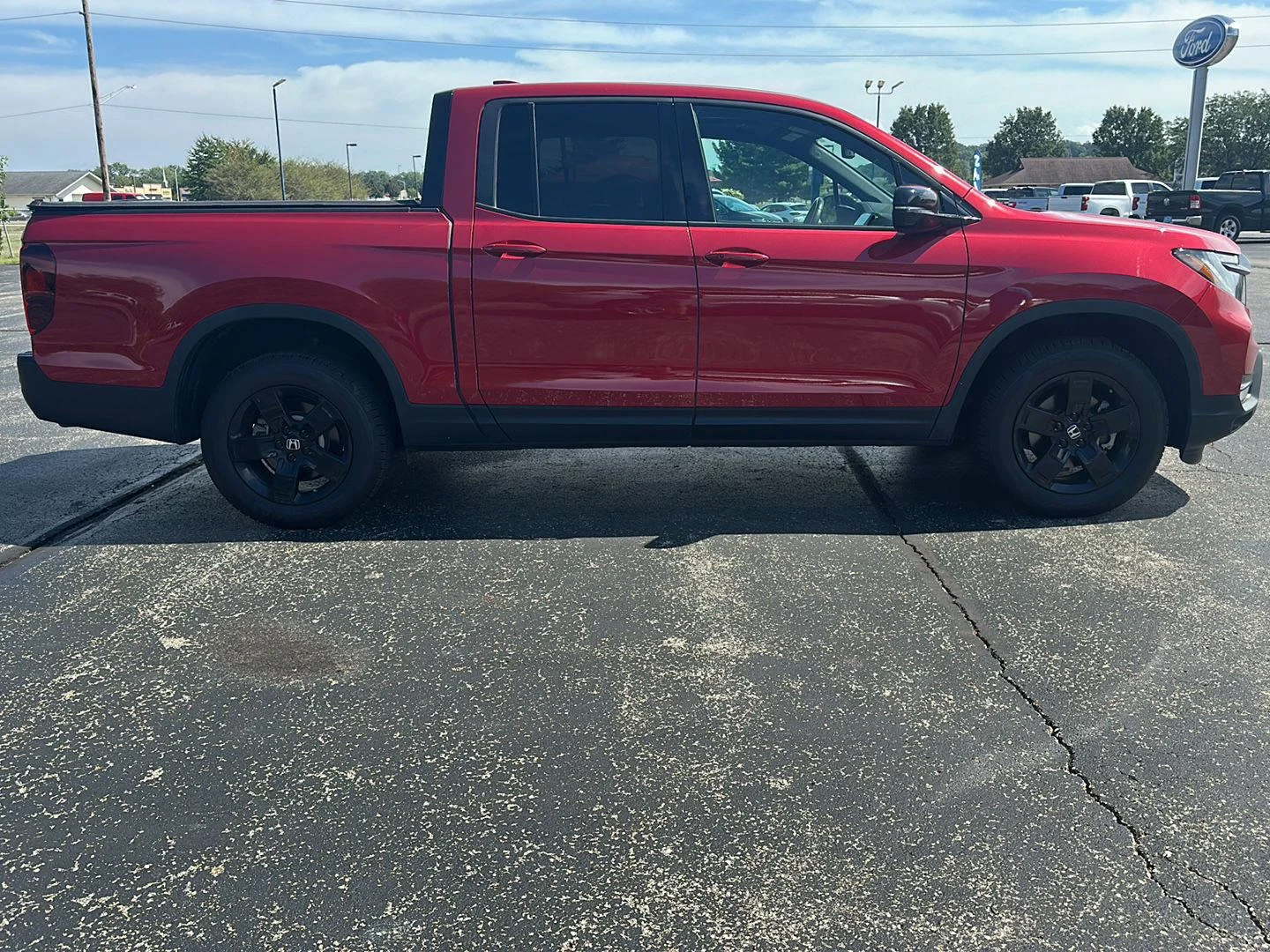 Used 2025 Radiant Red Metallic II Honda Black Edition image 4