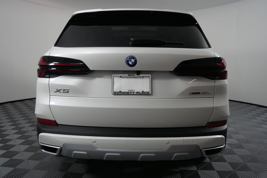 Used 2026 Mineral White Metallic BMW xDrive50e image 5