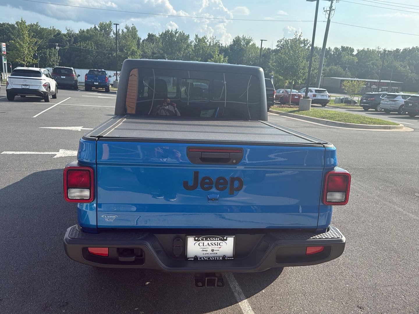 Used 2023 Hydro Blue Pearlcoat Jeep Sport image 6