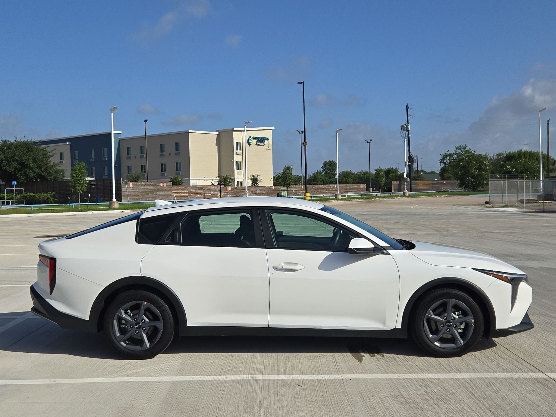 Used 2025 Snow White Pearl Kia LXS image 2