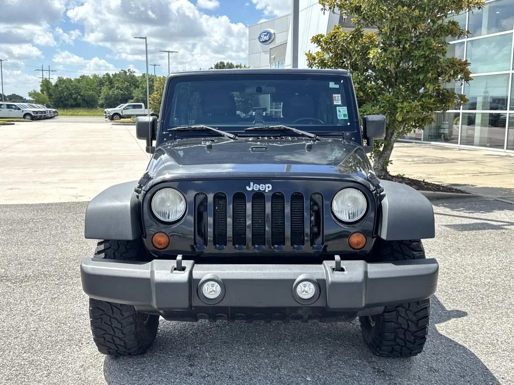 Used 2012 Jeep Wrangler Unlimited Sport with VIN 1C4HJWDG5CL112015 for sale in New Iberia, LA