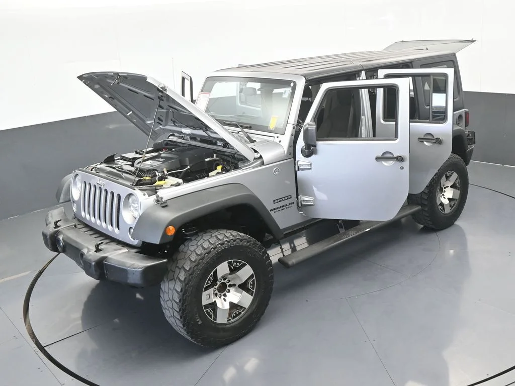 Used 2016 Billet Silver Metallic Clearcoat Jeep Unlimited Sport image 63