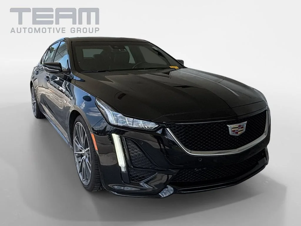 Used 2023 BLACK RAVEN Cadillac Sport image 1