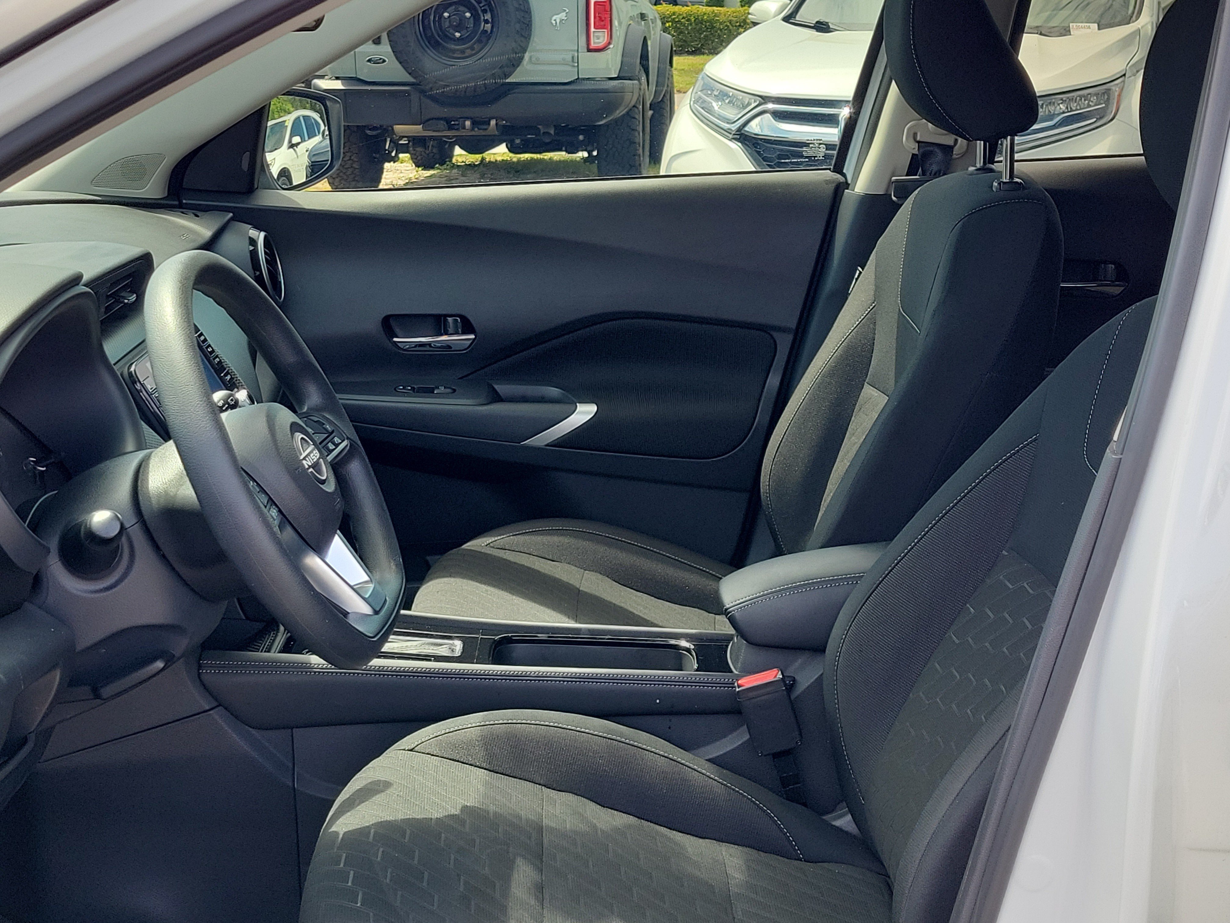 Used 2024 Aspen White Tricoat/Super Black Nissan SV image 21