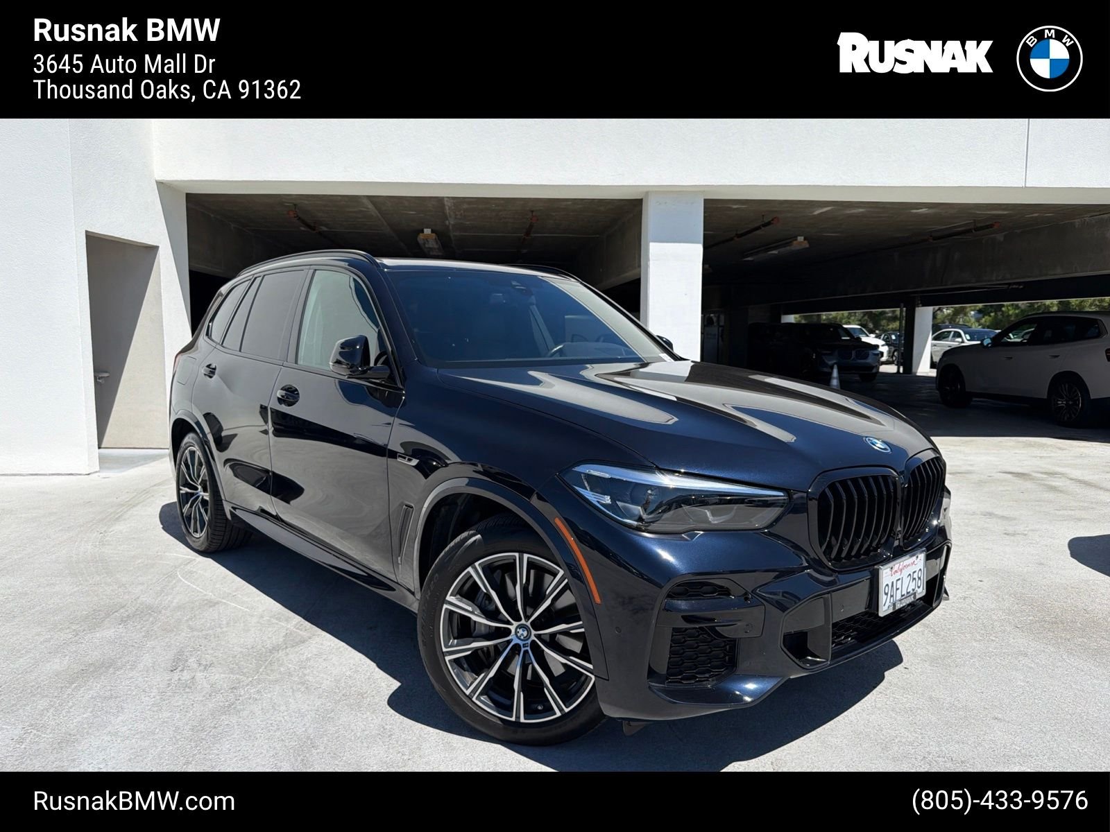Certified Used 2022 Carbon Black Metallic BMW xDrive45e image 1