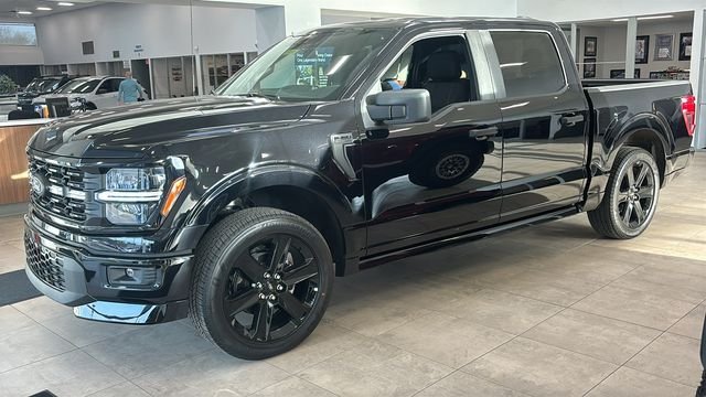 View vehicle photo 2