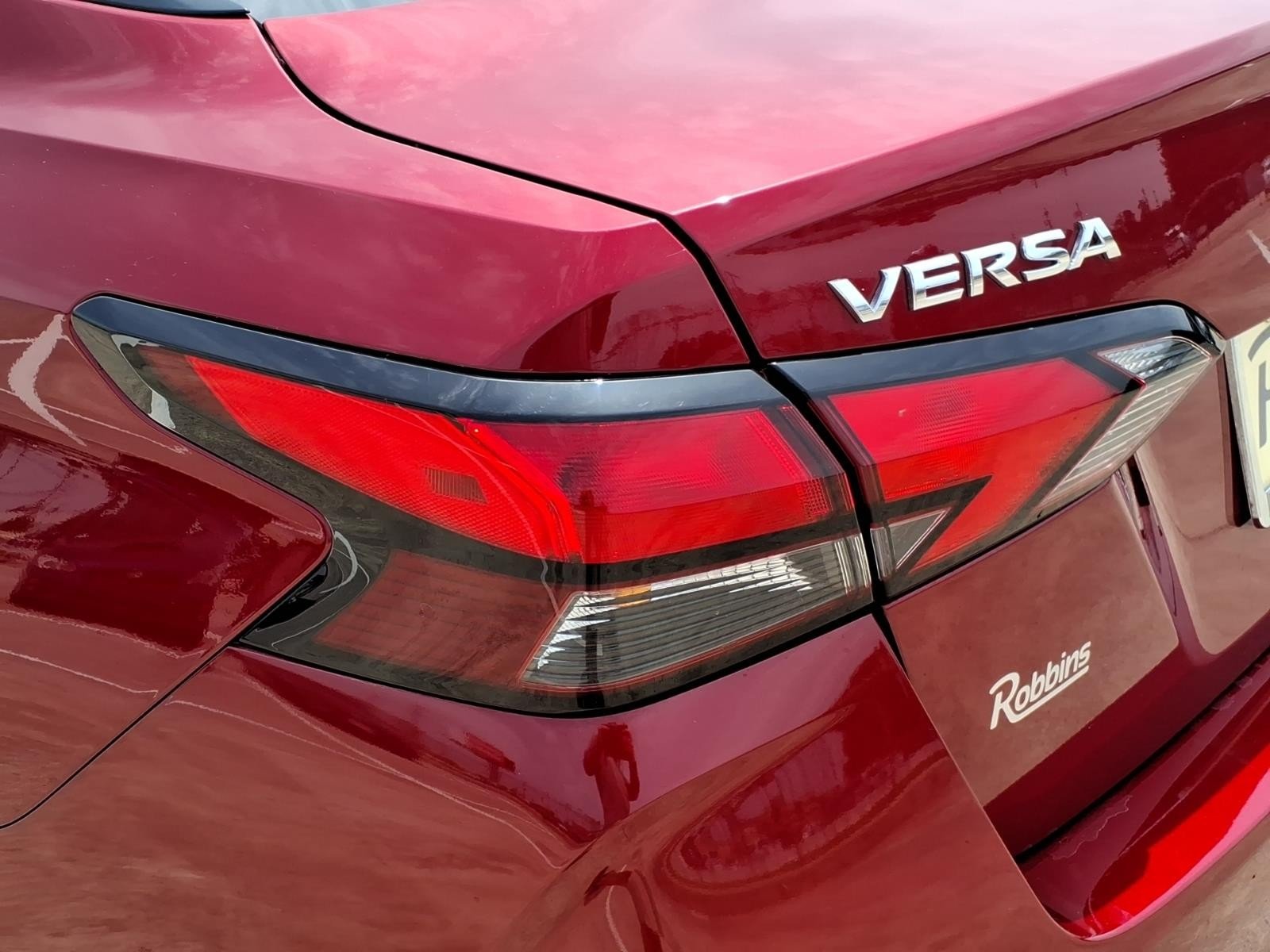 2025 Nissan Versa SV Red at Robbins Nissan