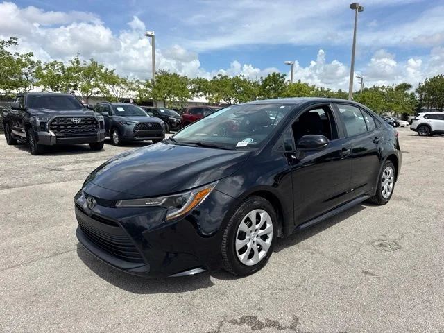 Used 2024 Black Toyota LE image 7