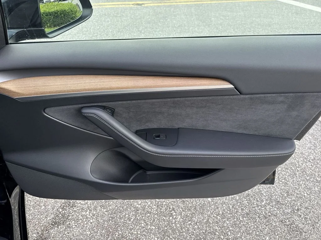Used 2023 Solid Black Tesla  image 43