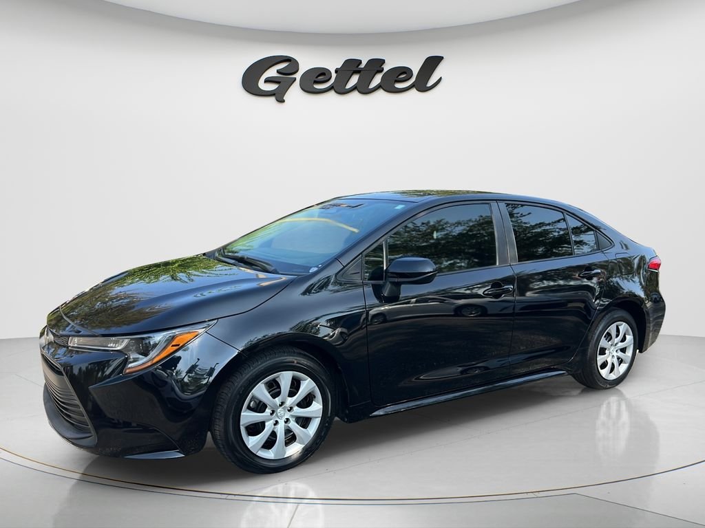 Used 2024 Black Toyota LE image 1