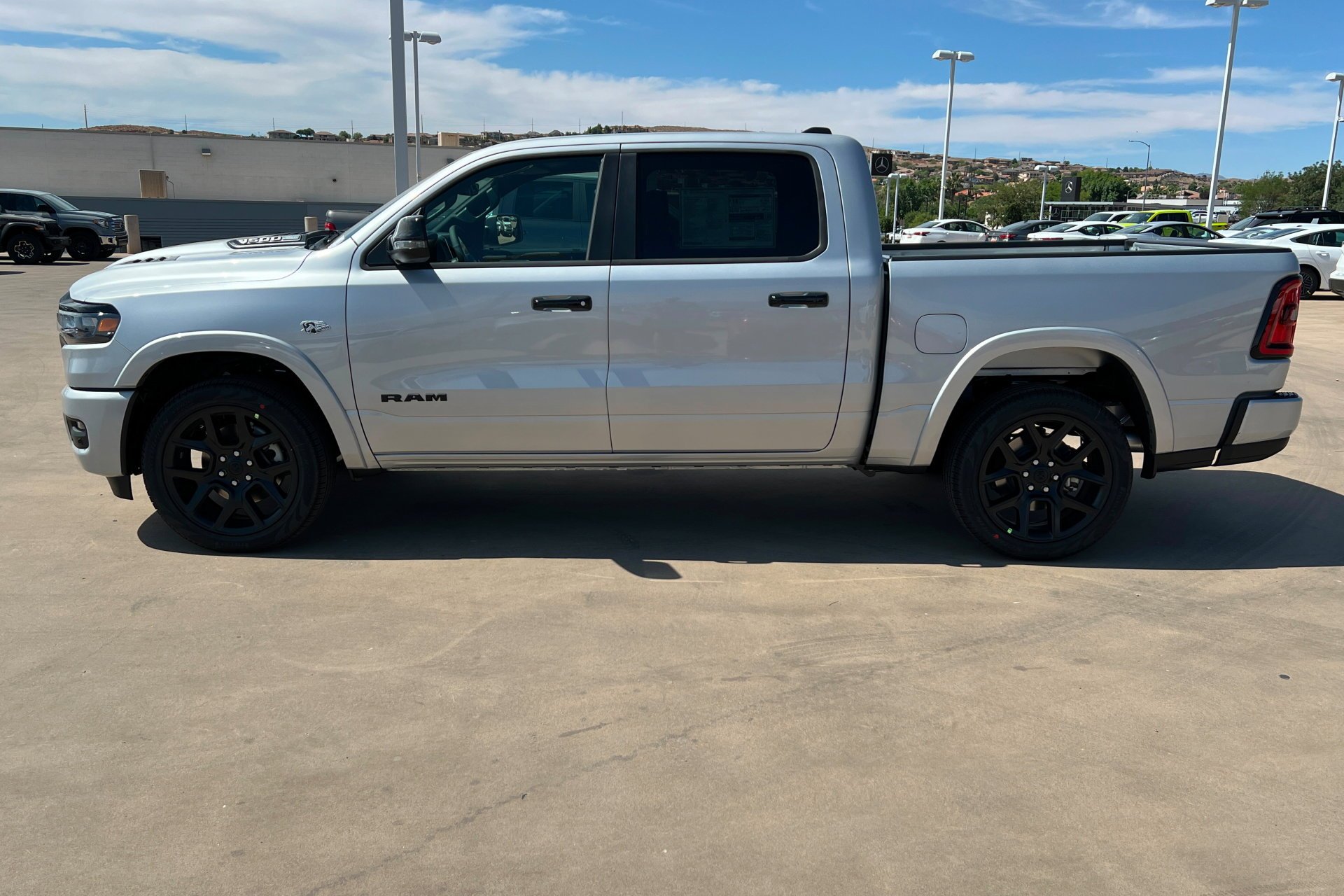 New 2026 Silver Zynith Exterior Paint RAM Laramie image 2