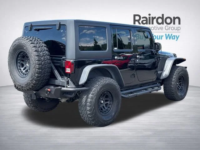 Used 2014 Black Clearcoat Jeep Unlimited Rubicon image 7