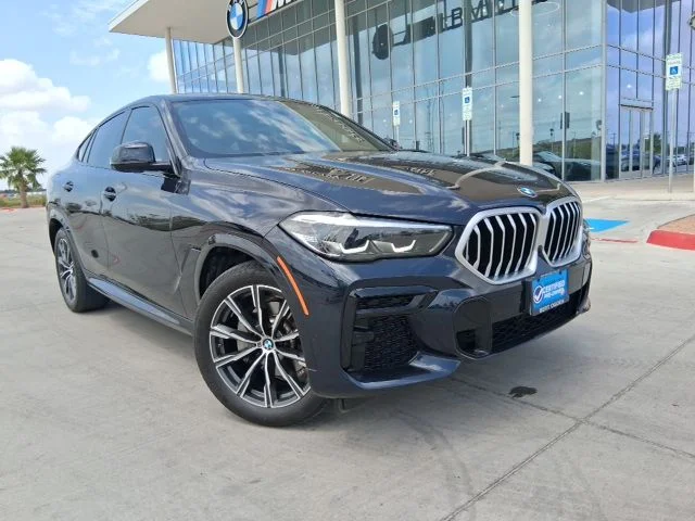 Used 2023 Black BMW xDrive40i image 1