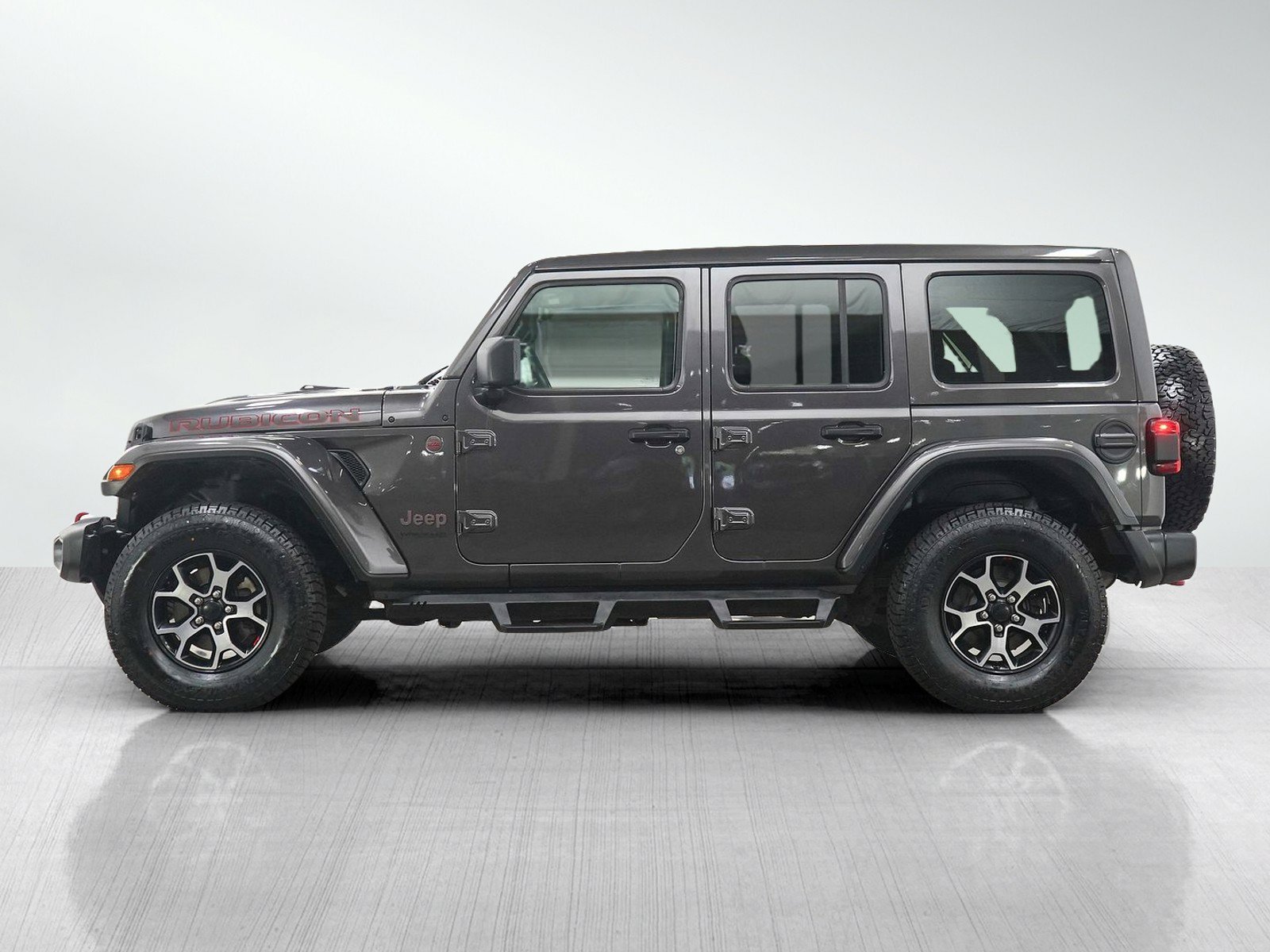 Used 2021 Jeep Wrangler Unlimited Rubicon with VIN 1C4HJXFG4MW588713 for sale in Minneapolis, Minnesota