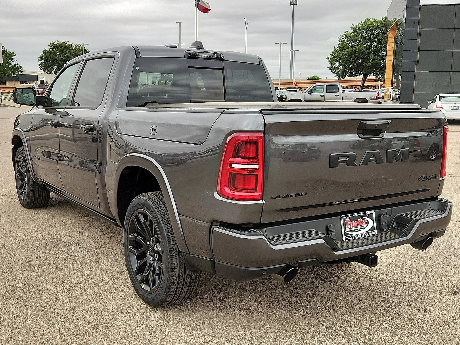 New 2026 Granite Crystal Metallic Clearcoat Ram LIMITED CREW CAB 4X4 5