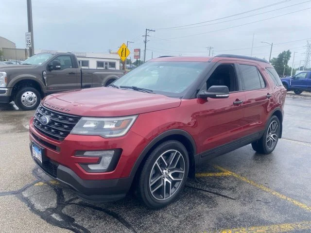 Used 2016 Ruby Red Metallic Ford Sport image 1