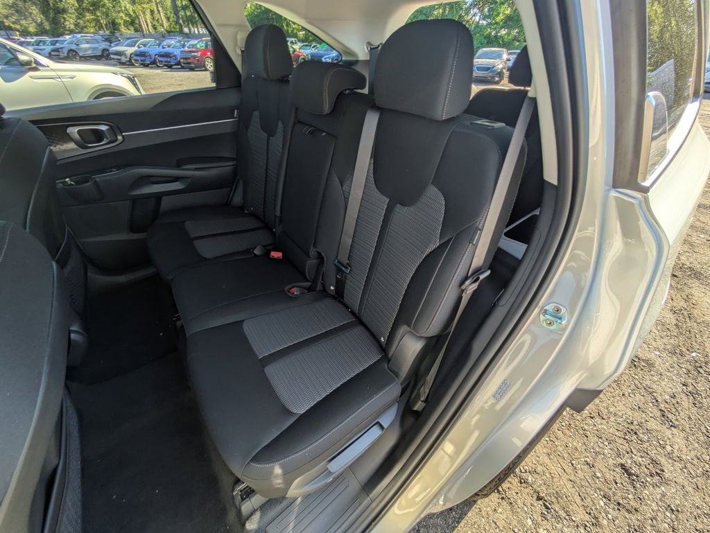 New 2026 Ivory Silver Kia LX image 13