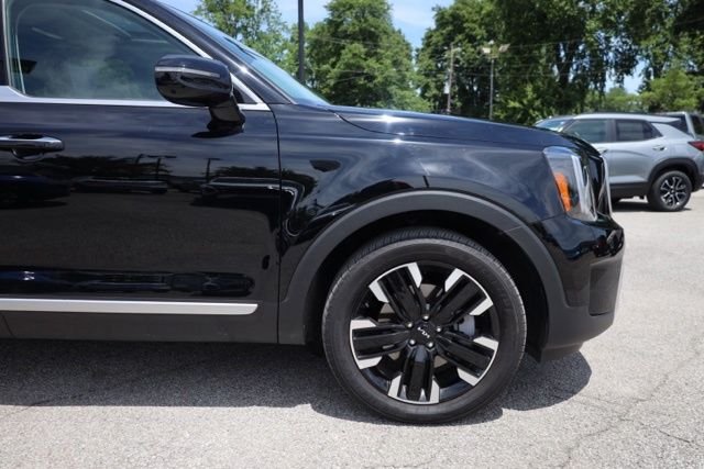 Used 2025 Ebony Black Kia SX-Prestige image 13