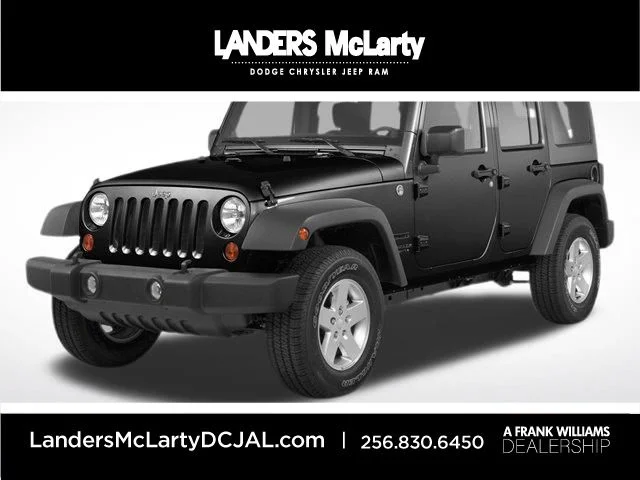 Used 2013 Black Jeep Unlimited Rubicon image 1