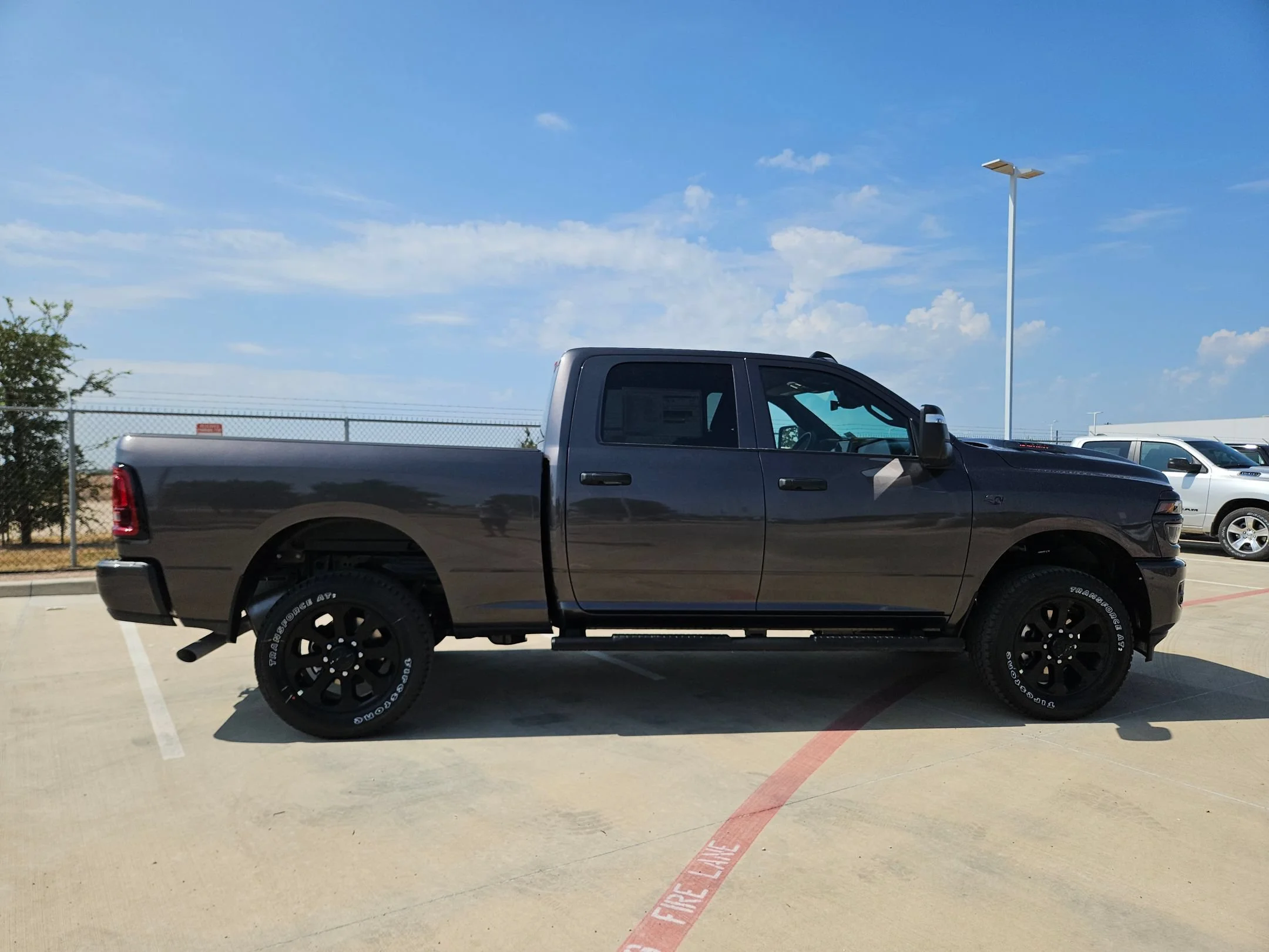 New 2027 Granite Crystal Metallic Clearcoat RAM Black Express image 2