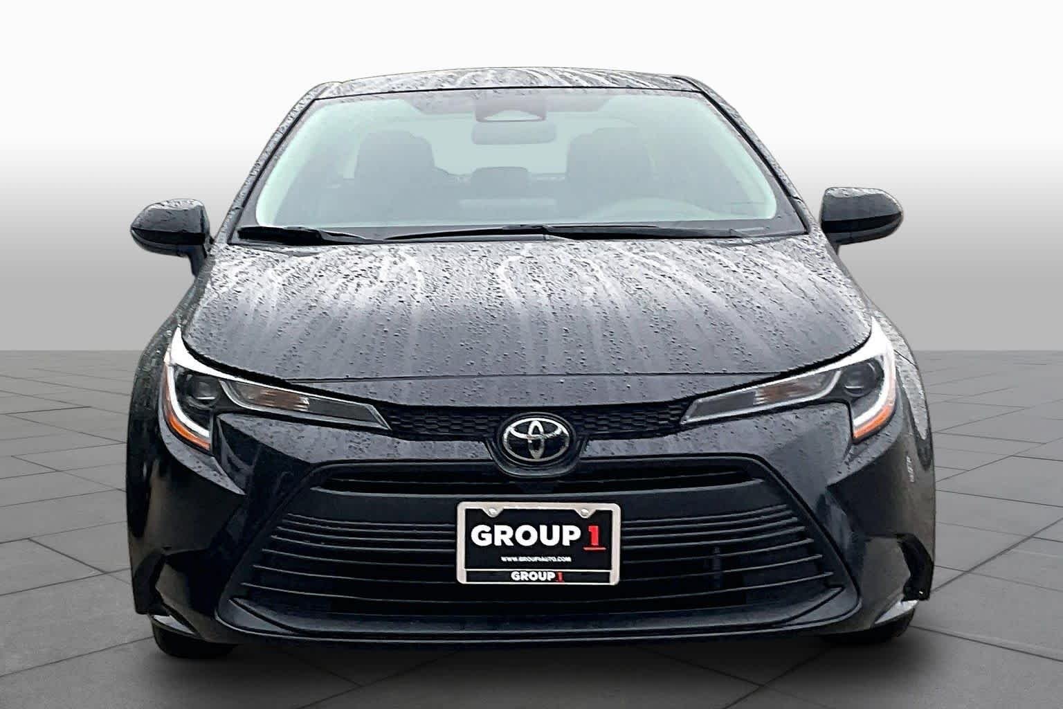Used 2024 Midnight Black Metallic Toyota LE image 4