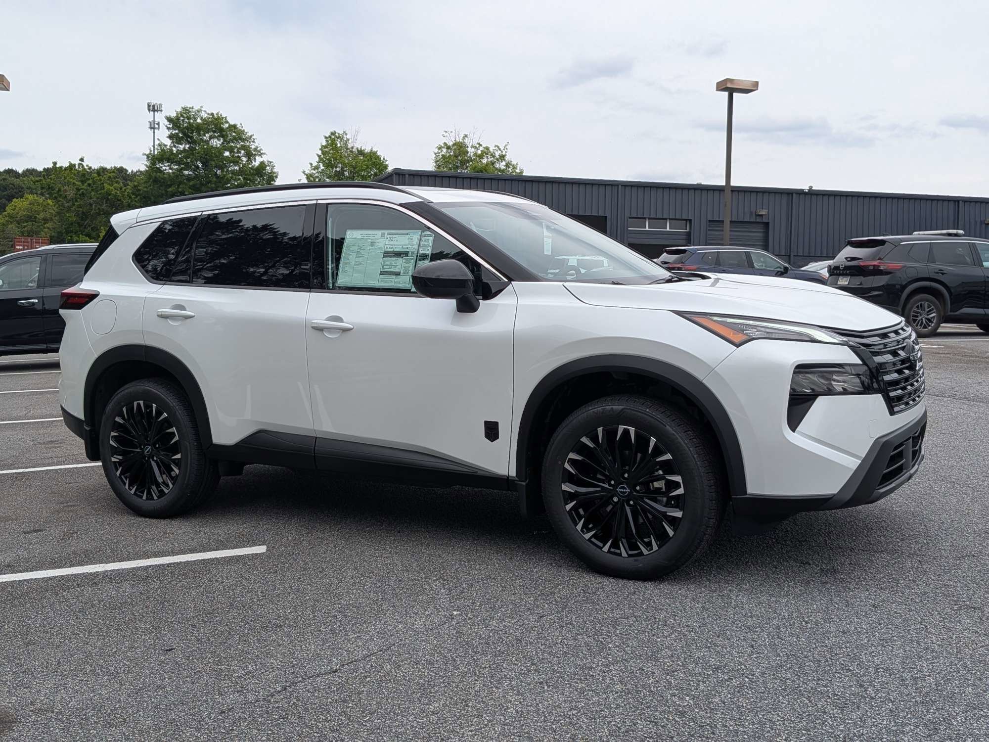 New 2026 White Nissan Dark Armor image 1