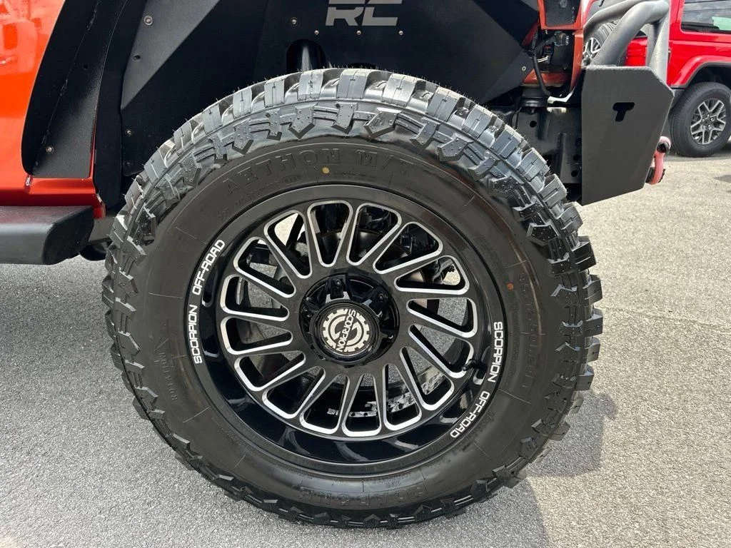 Used 2009 Orange Jeep Unlimited X image 14