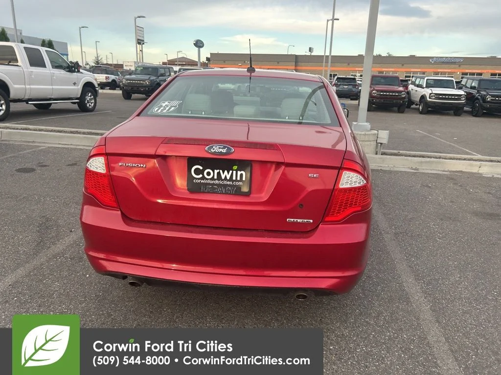 Used 2012 Red Candy Metallic Tinted Clearcoat Ford SE image 10