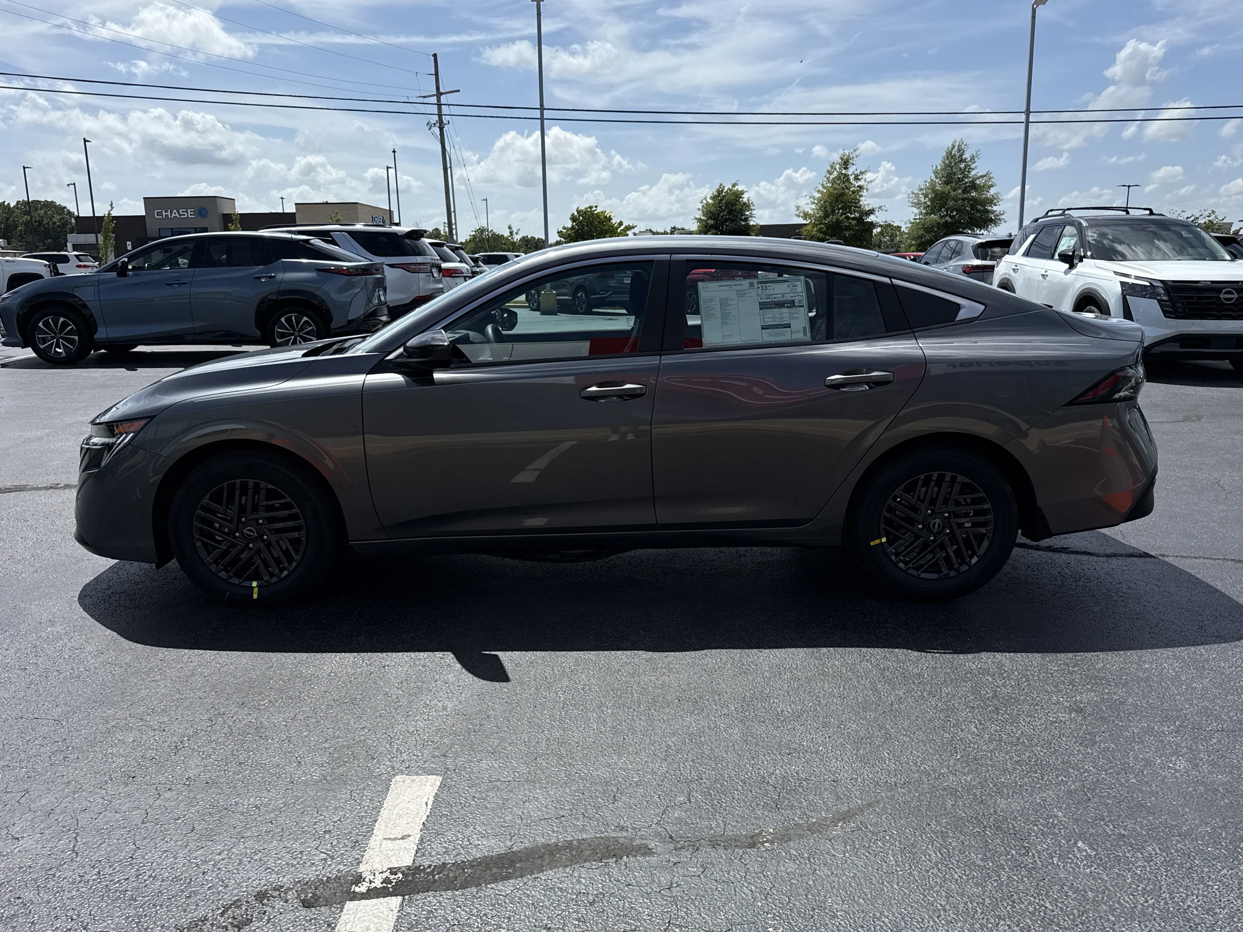 New 2026 Gun Metallic Nissan SV image 9