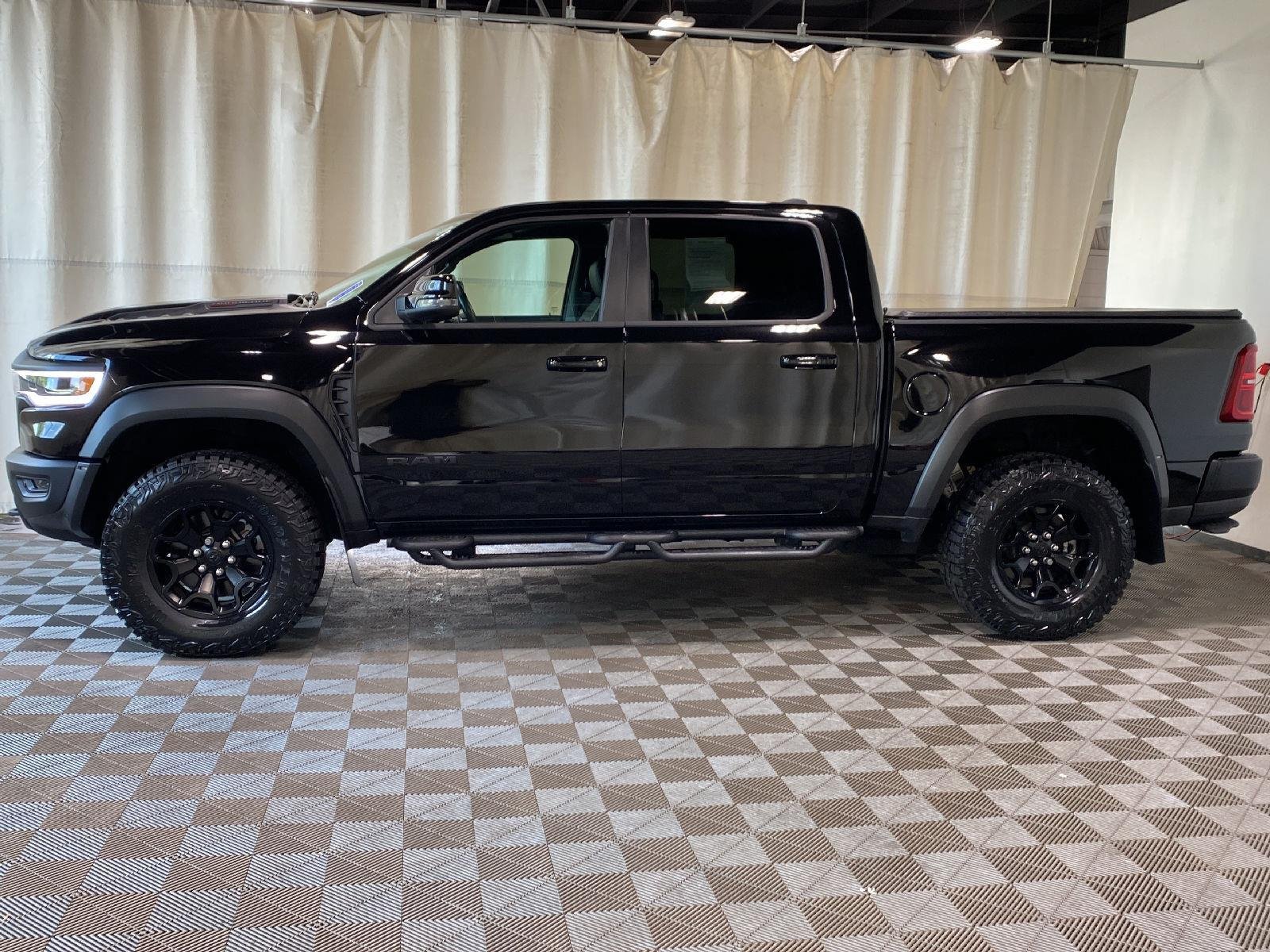 Used 2025 Diamond Black Crystal Pearlcoat Ram RHO image 16