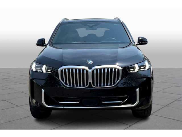 New 2026 Black Sapphire Metallic BMW sDrive40i image 3