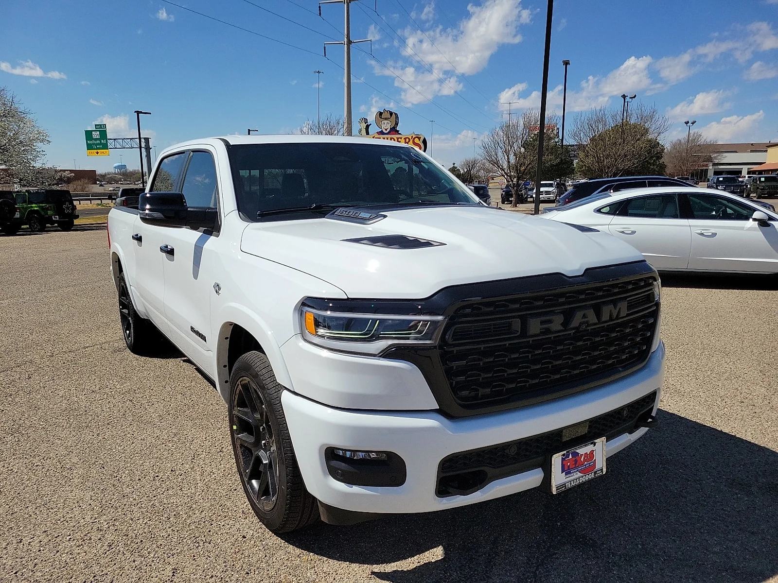 New 2026 Bright White Ram LIMITED CREW CAB 4X4 5