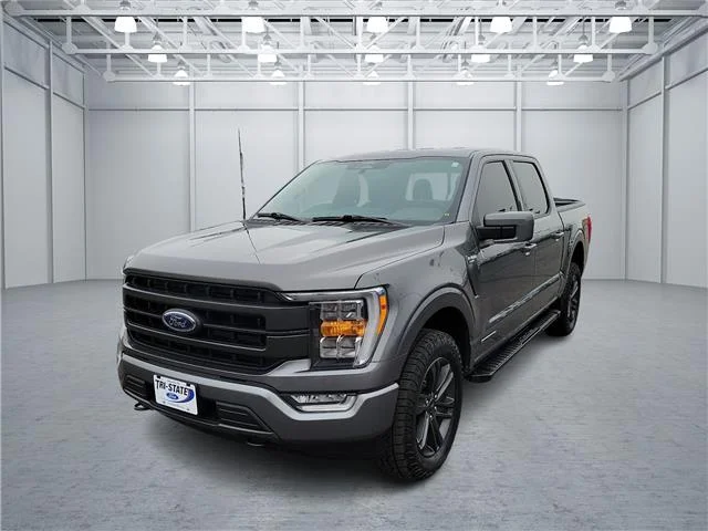 Used 2023 Carbonized Gray Metallic Ford Lariat 4x4 SuperCrew Cab 5.5 ft. box 145 in. WB image 1
