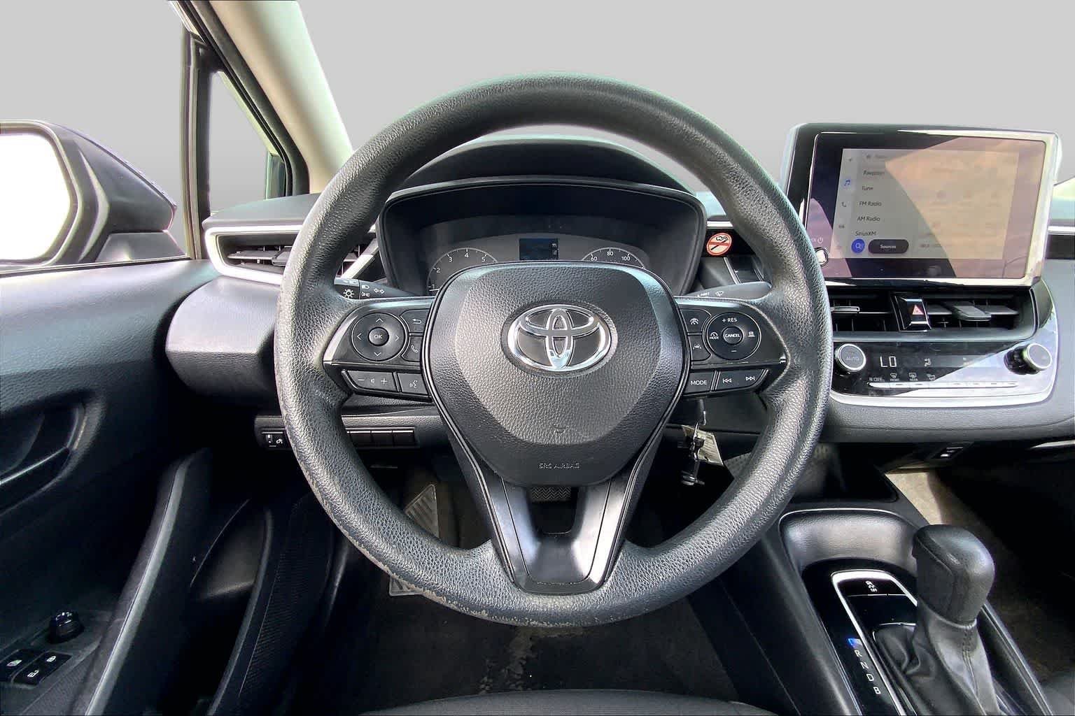 Used 2024 Midnight Black Metallic Toyota LE image 6