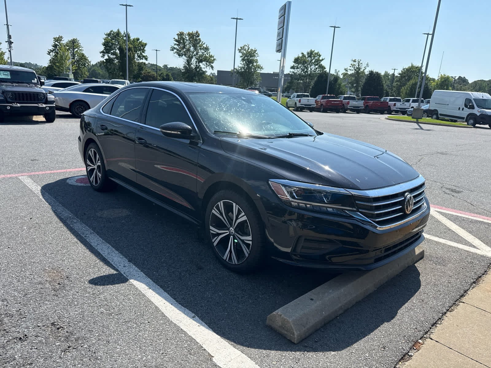 Used 2020 Deep Black Pearl Volkswagen 2.0T SEL image 1