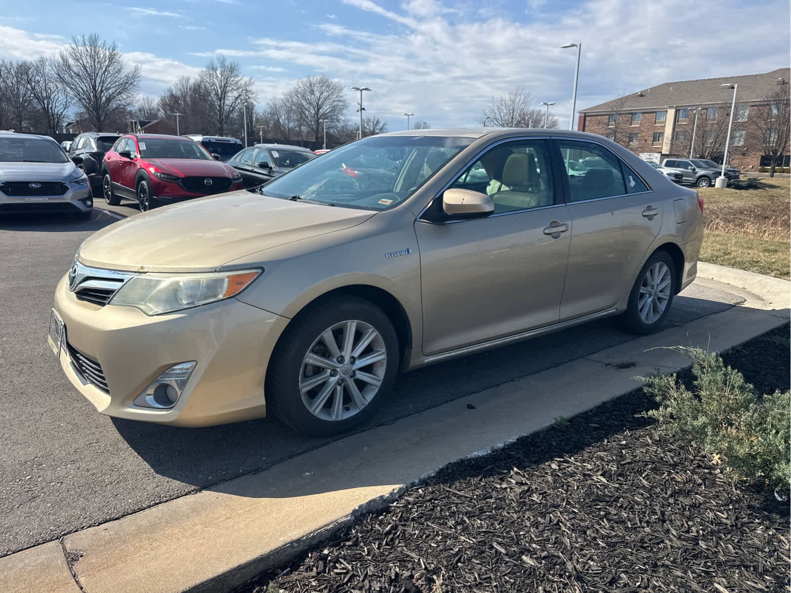 Used 2012 Toyota Camry XLE Hybrid with VIN 4T1BD1FK9CU056880 for sale in Kansas City