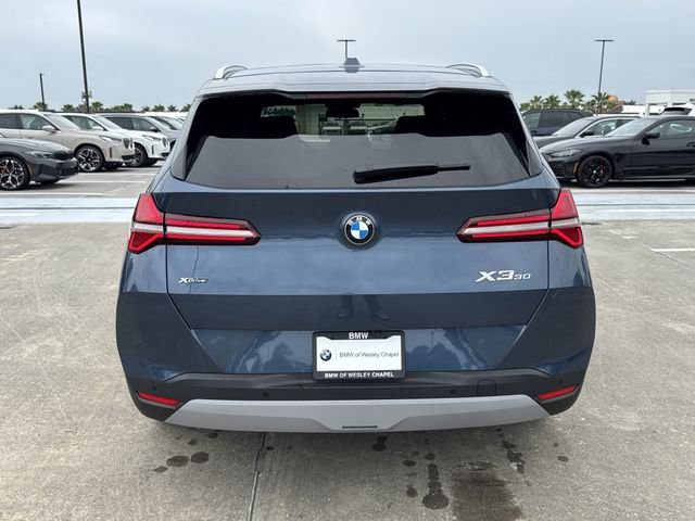 New 2026 Arctic Race Blue metallic BMW 30 xDrive image 6