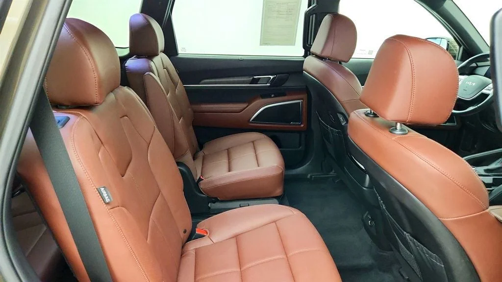 Used 2025 Dark Moss Kia SX AWD w/ Captain