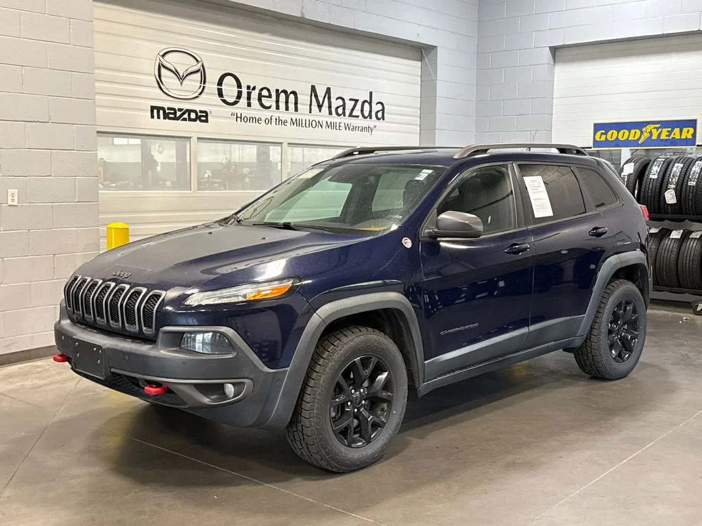 Used 2015 Blue Jeep Trailhawk image 1