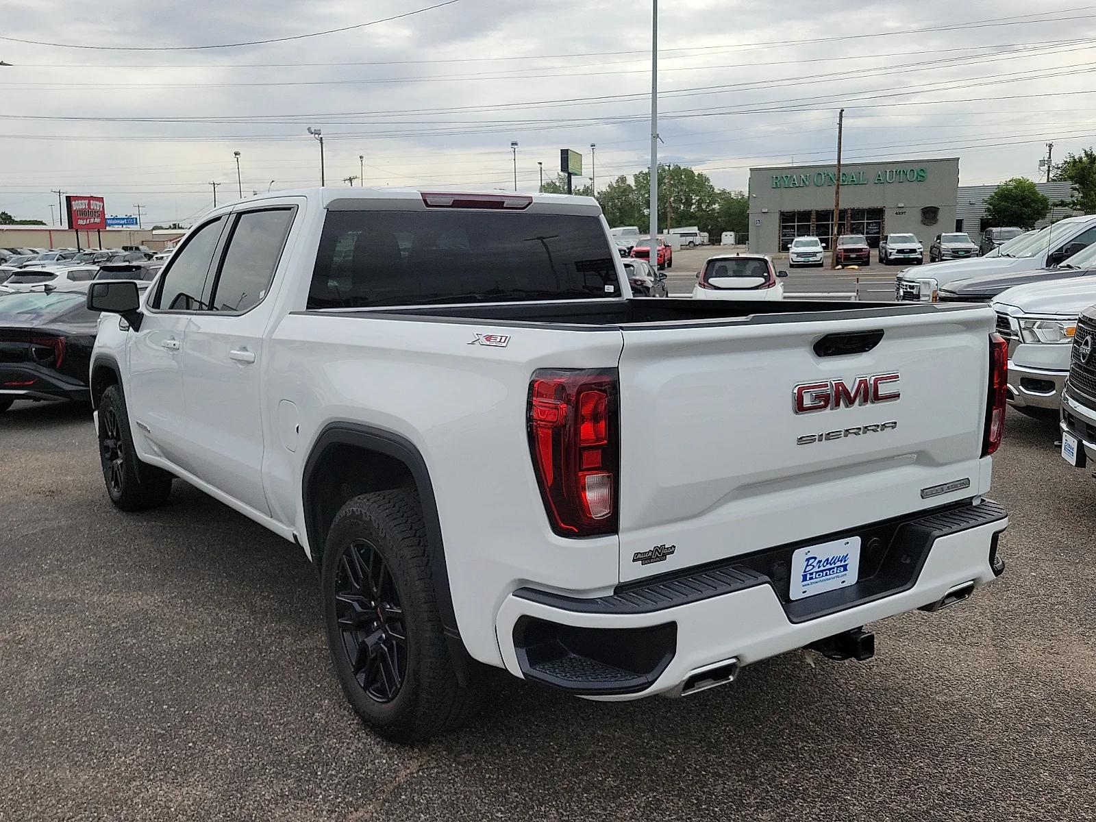Certified Used 2024 Summit White GMC 4WD Crew Cab Short Box Elevation with 3SB image 7
