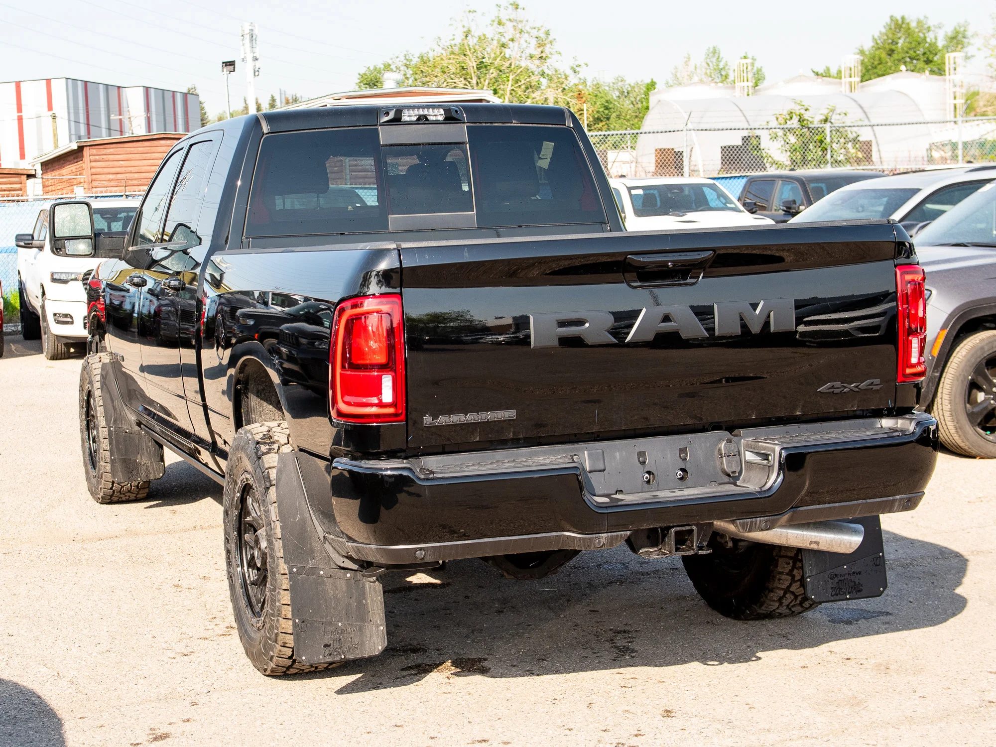 New 2026 Black RAM Laramie* Mega Cab, 2 Inch Lift, 35 Inch Tires, Trigger Industries Mudflaps image 5