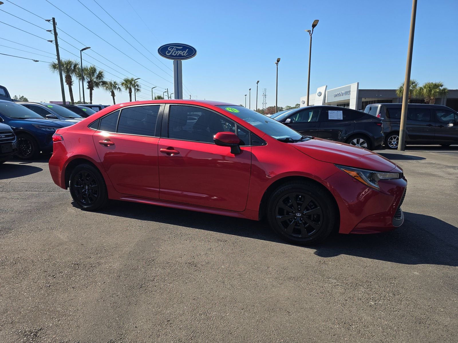 Used 2021 Toyota Corolla LE with VIN JTDEPMAE9MJ173261 for sale in Spring Hill, FL