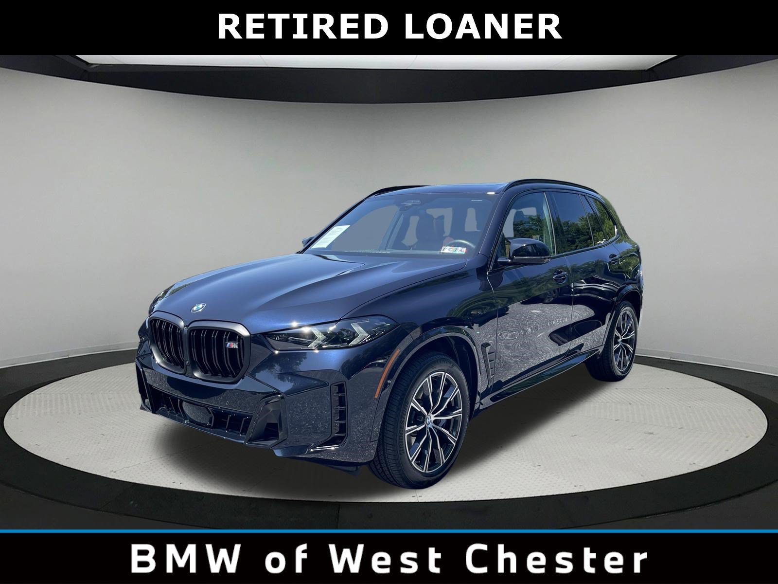 Certified Used 2026 Carbon Black Metallic BMW M60i image 1