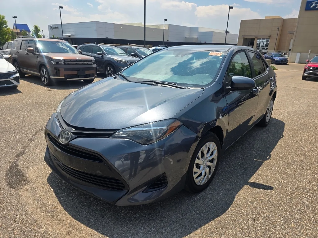 Used 2019 Slate Metallic Toyota LE image 12
