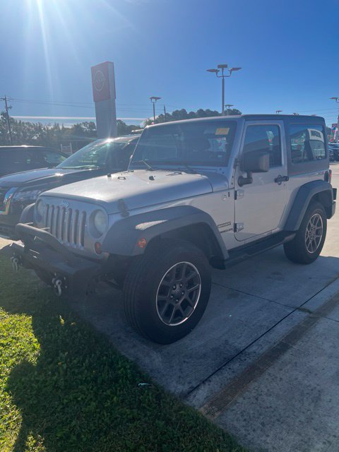Used 2013 Silver Jeep Sport image 1
