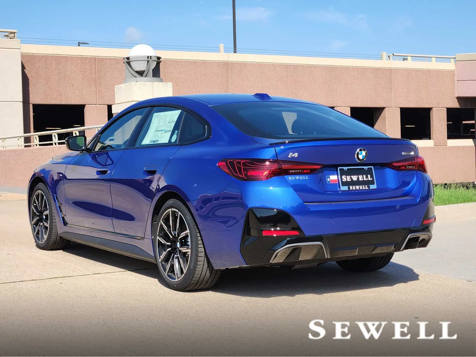 New 2026 Portimao Blue Metallic BMW eDrive40 image 3